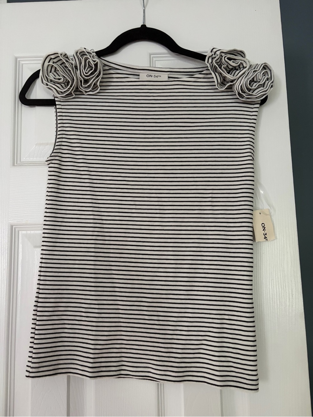 ON	3=White & Black Striped women’s ' Rosette Shoulder Tee